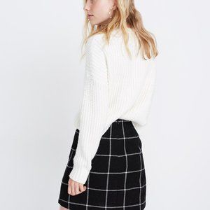 Museum patch-pocket mini skirt in windowpane navy